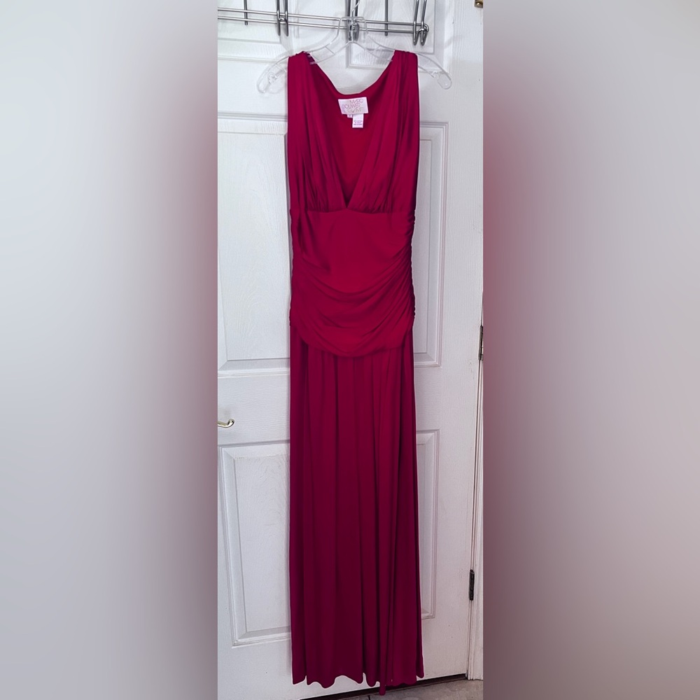 Marc Bouwer Glamit size 4 long jersey evening gown. Side zipper with deep Vneck.